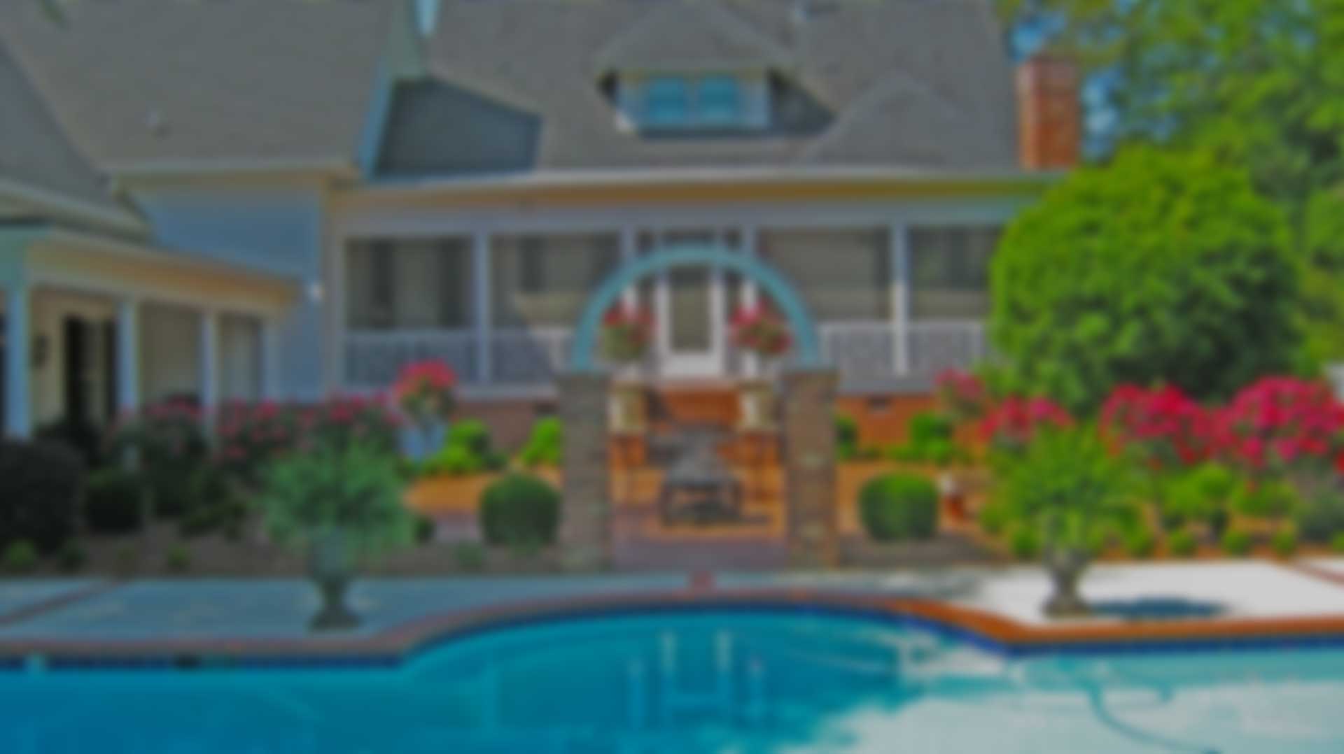 Blurred landscape project around pool.