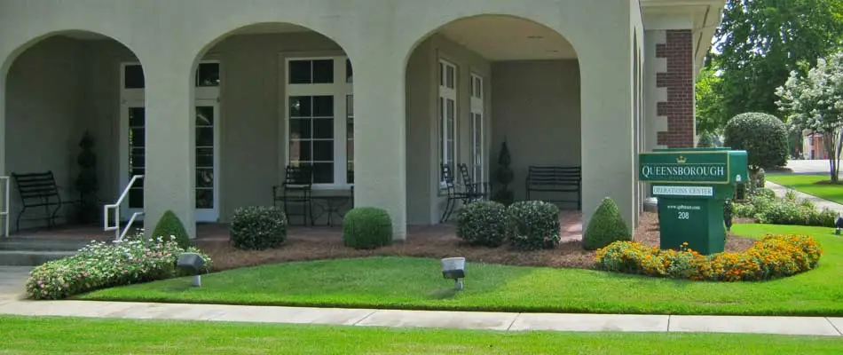 Lawn care and landscaping at office building in Wrens, GA.