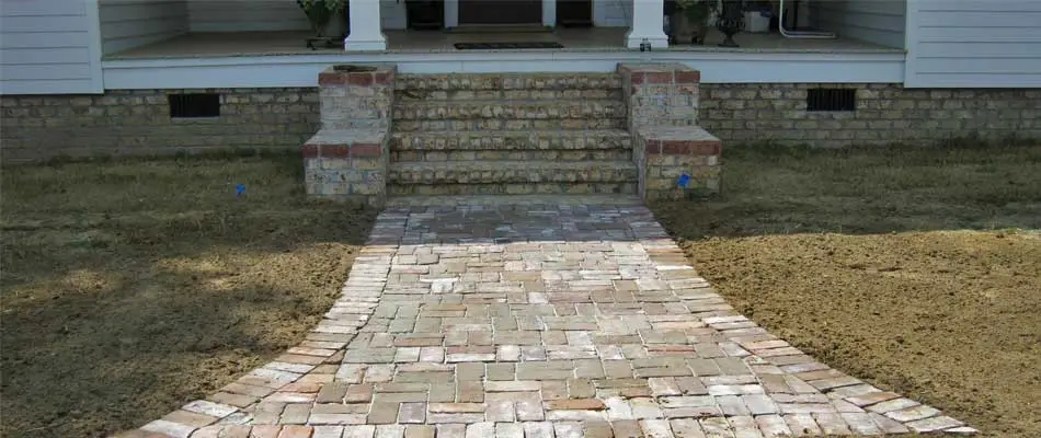 Completed hardscaping project including custom steps and walkway at a home in Waynesboro, GA.