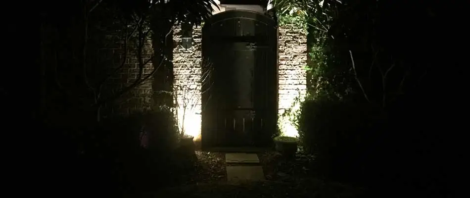 Front entry of a home in Louisville, GA. with landscape lighting.