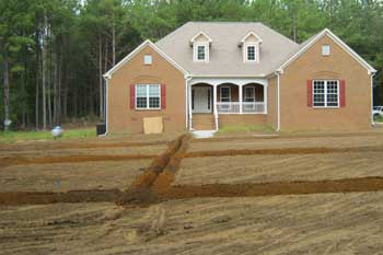 New irrigation system installation in the front lawn of a home in Louisville, GA.