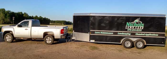 Nichols Lawn Care truck and trailer.